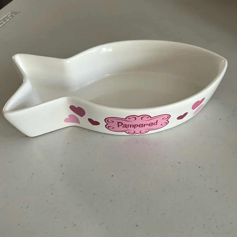 Cat food bowl in a fish style for food. Pampered